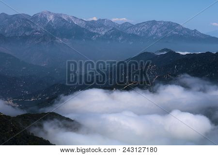 Low Laying Clouds And Fog Surrounding Mountain Ridges Taken In The San Gabriel Mountains, Ca