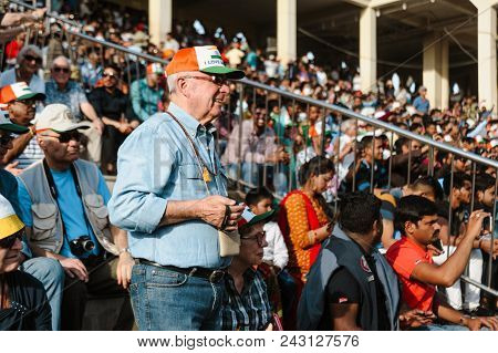 26 February 2018 Amritsar, India. Crowd Of White European Tourists At India Pakistan Wagah Border Sh