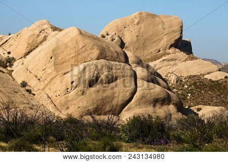 Sandstone Rocks Surrounded By Chaparral Shrubs Uplifted From A Geological Fault Taken At The Mormon 