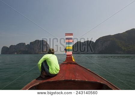 Man Sitting On The Boat's Bow. Thailand