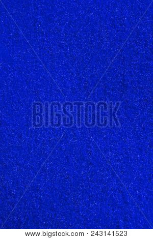 Blue Fleecy Material Texture. Detailed Fibers Fluffy Surface Background.