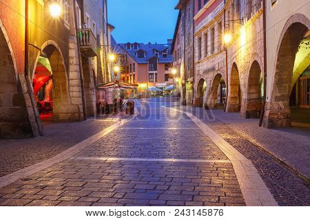 Nice Street Rue Sainte-claire In Old Town Of Annecy At Rainy Night, France