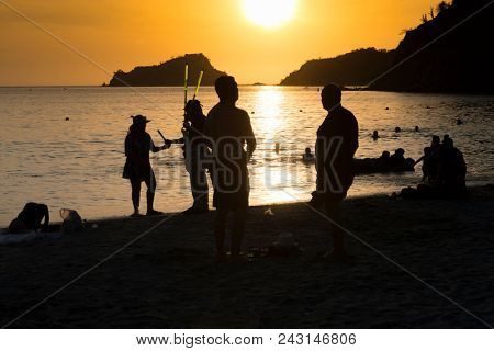 People at the beach Sunset at Santa Marta Colombia 