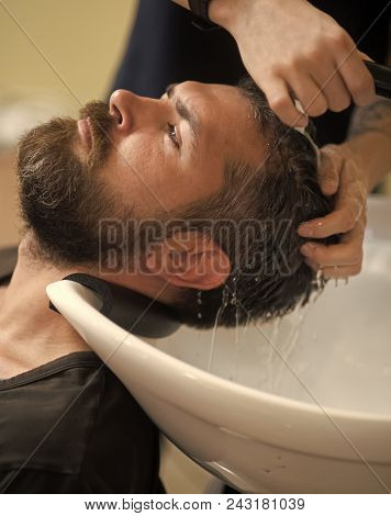 Male Face. Issues Affecting Boy. Hipster With Serious Face In Barbershop, New Technology. Barber And