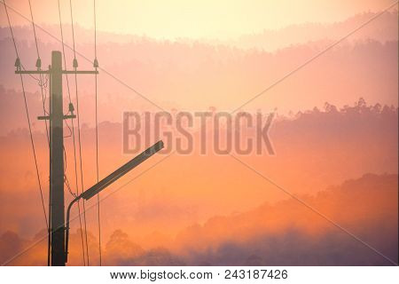 Street light and mountain range double exposure