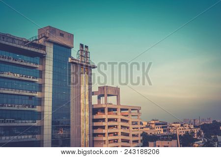 Silhouette Of Construction Site At Sunset- Cityscape