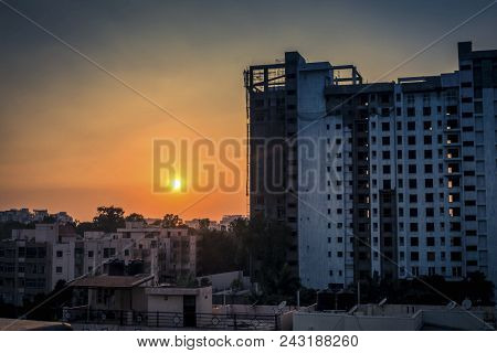 Silhouette Of Construction Site At Sunset- Cityscape