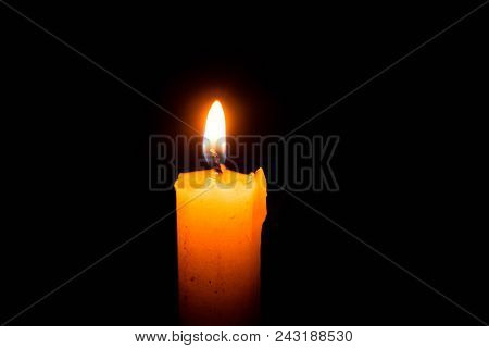 Abstract Single Lit Candle With Quite Flame
