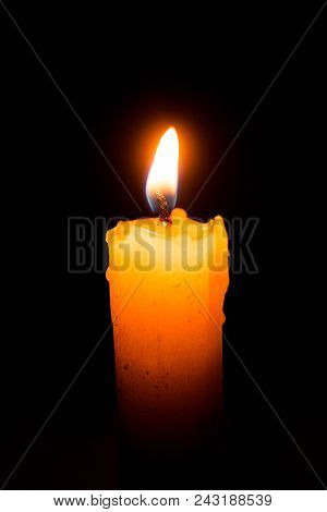Abstract Single Lit Candle With Quite Flame