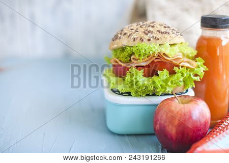 Sandwich For School Lunch And Juice, Healthy Lunch. School Books On The Table. Copy Space.