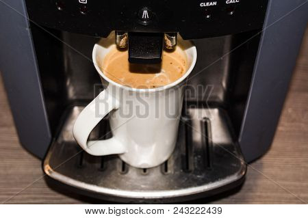 Office Coffee Machine, Professional Machine With A Cup Full Of Coffee According To Slat Type.