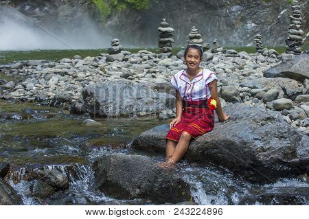 Batad, Philippines - May 02 : Girl From Ifugao Minority Near A Waterfall In Batad The Philippines On