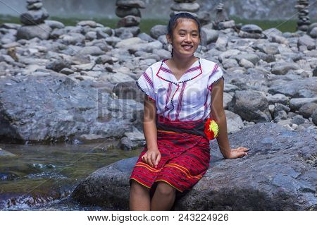Batad, Philippines - May 02 : Girl From Ifugao Minority Near A Waterfall In Batad The Philippines On