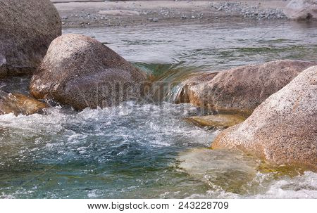 Fresh And Tumultuous Natural River In The Mountains Of The Dolomites