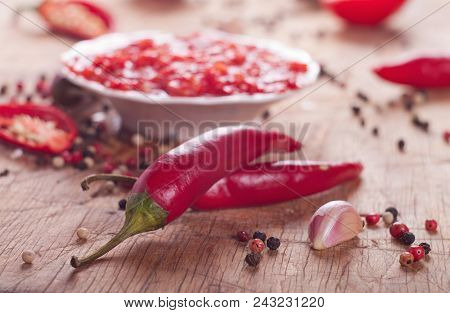 Red Hot Chilli Sauce On The Table