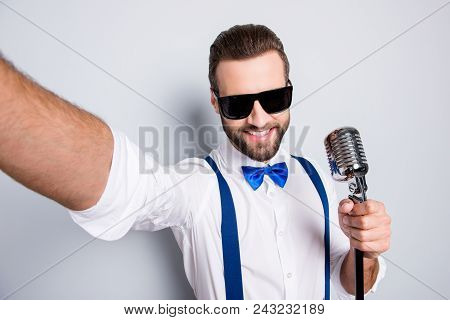 Self Portrait Of Stylish Elegant Singer Wearing Bowtie Shirt Suspenders Shooting Selfie On Front Cam