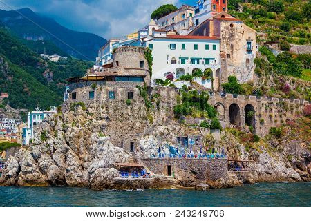 Wonderful Italy. Small Town Of Amalfi Village With Turquoise Sea And Colorful Houses On Slopes Of Am