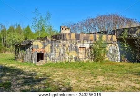 Old Abandoned Building. Destroyed Building After A Military Unit.