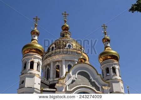 Orthodox Crosses On Gold Domes Blue Sky With Clouds