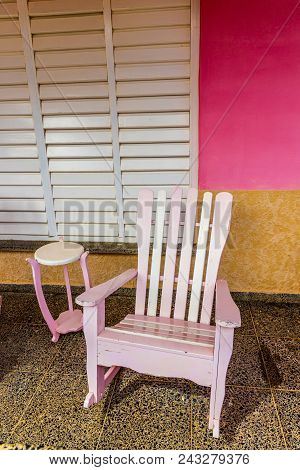 Vinales, Cuba. January 2018. A View Of Xa Pink Rocking Chair, In Vinales, Cuba.