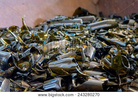 Broken Brown Wine Glass Bottles. Warehouse Of Broken Glass