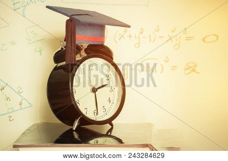 Graduation Cap On Top Retro Alarm Clock With Math Formula Equation Graph On Screen Classroom. Ideas 