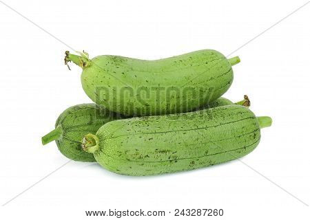 Pile Of Fresh Green Sponge Gourd Or Luffa Isolated On White Background