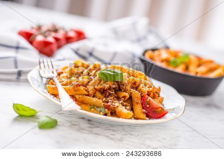 Italian Food And Pasta Pene With Bolognese Sause On Plate