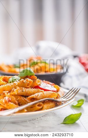 Italian Food And Pasta Pene With Bolognese Sause On Plate