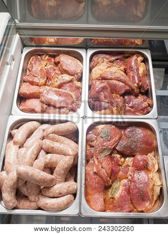 Various Pieces Of Meat On A Cutting Table