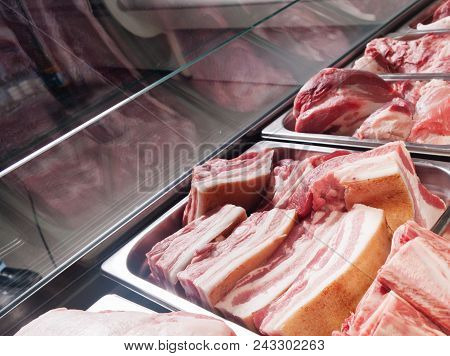 Various Pieces Of Meat On A Cutting Table