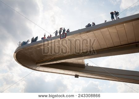 Moscow, Russia - May 17, 2018: People Resting On Floating Bridge In Zaryadye Park. Zaryadye Park Is 