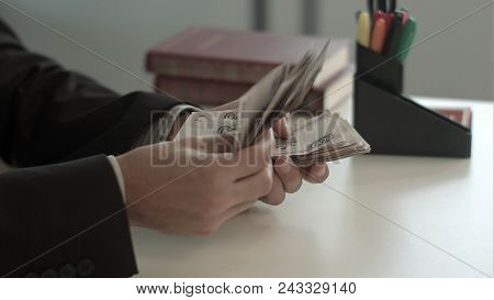 Old Woman Counts Money. Professional Shot In 4k Resolution. You