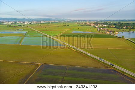 Aerial: Rice Paddies, Flooded Cultivated Fields Farmland Rural Italian Countryside, Agriculture Occu