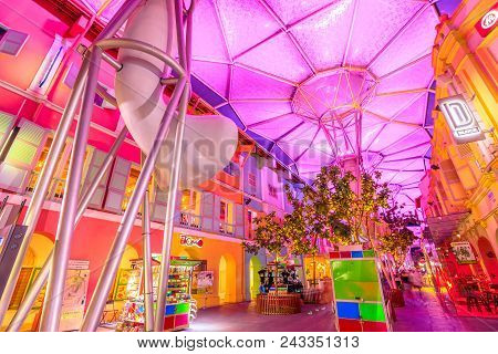 Singapore - May 5, 2018: Colorful Futuristic Pinky Umbrellas That Cover The Streets Of Clarke Quay, 
