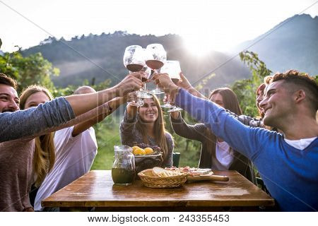 Friends Having Dinner In Garden