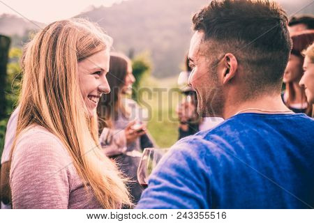 Friends Having Dinner In Garden