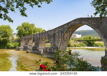 The Famous Stone Bridge Of Arta, In Epirus Region, In Greece. It Is The Most Legendary Stone Bridge 