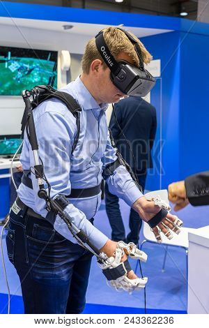 Berlin - April 26, 2018: The Stand Of Roscosmos. Demonstration Of The Operation Of The Hardware-soft