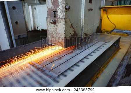 Grinding Of Metal On A Flat Machine Tool With Water Cooling. Metalworking Industry.