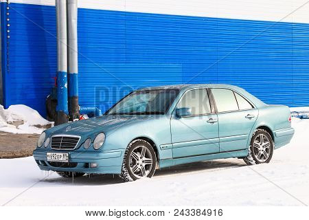 Novyy Urengoy, Russia - March 12, 2017: Motor Car Mercedes-benz W210 E-class In The City Street.