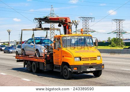 Moscow, Russia - June 2, 2012: Orange Tow Truck Zil 5301 Bychok At The Interurban Freeway.
