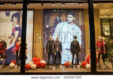 MILAN, ITALY - CIRCA NOVEMBER, 2017: window display at Guess store in Milan. Guess is an American clothing brand and retailer.