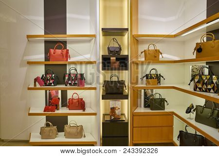 MILAN, ITALY - CIRCA NOVEMBER, 2017: bags on display at a Longchamp store in Milan. Longchamp is a French luxury leather goods company.