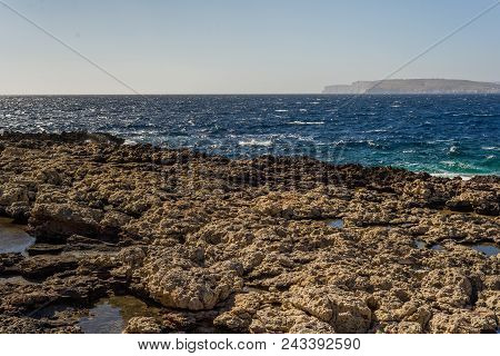 Photo Of Sea Water Beating Against Rock, Cirkewwa, Malta