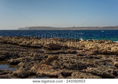 Photo Of Sea Water Beating Against Rock, Cirkewwa, Malta