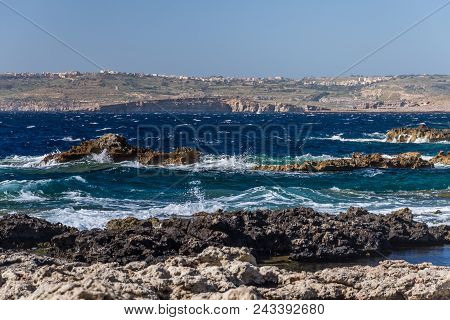 Photo Of Sea Water Beating Against Rock, Cirkewwa, Malta