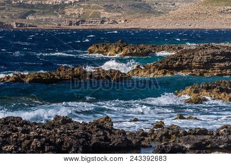 Photo Of Sea Water Beating Against Rock, Cirkewwa, Malta