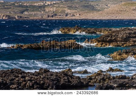 Photo Of Sea Water Beating Against Rock, Cirkewwa, Malta