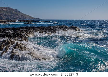 Photo Of Sea Water Beating Against Rock, Cirkewwa, Malta